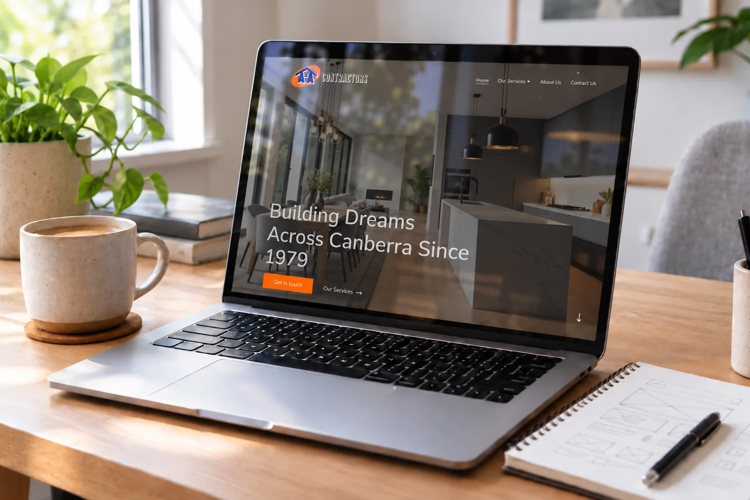 Laptop showing a search-optimised small business website on a timber desk